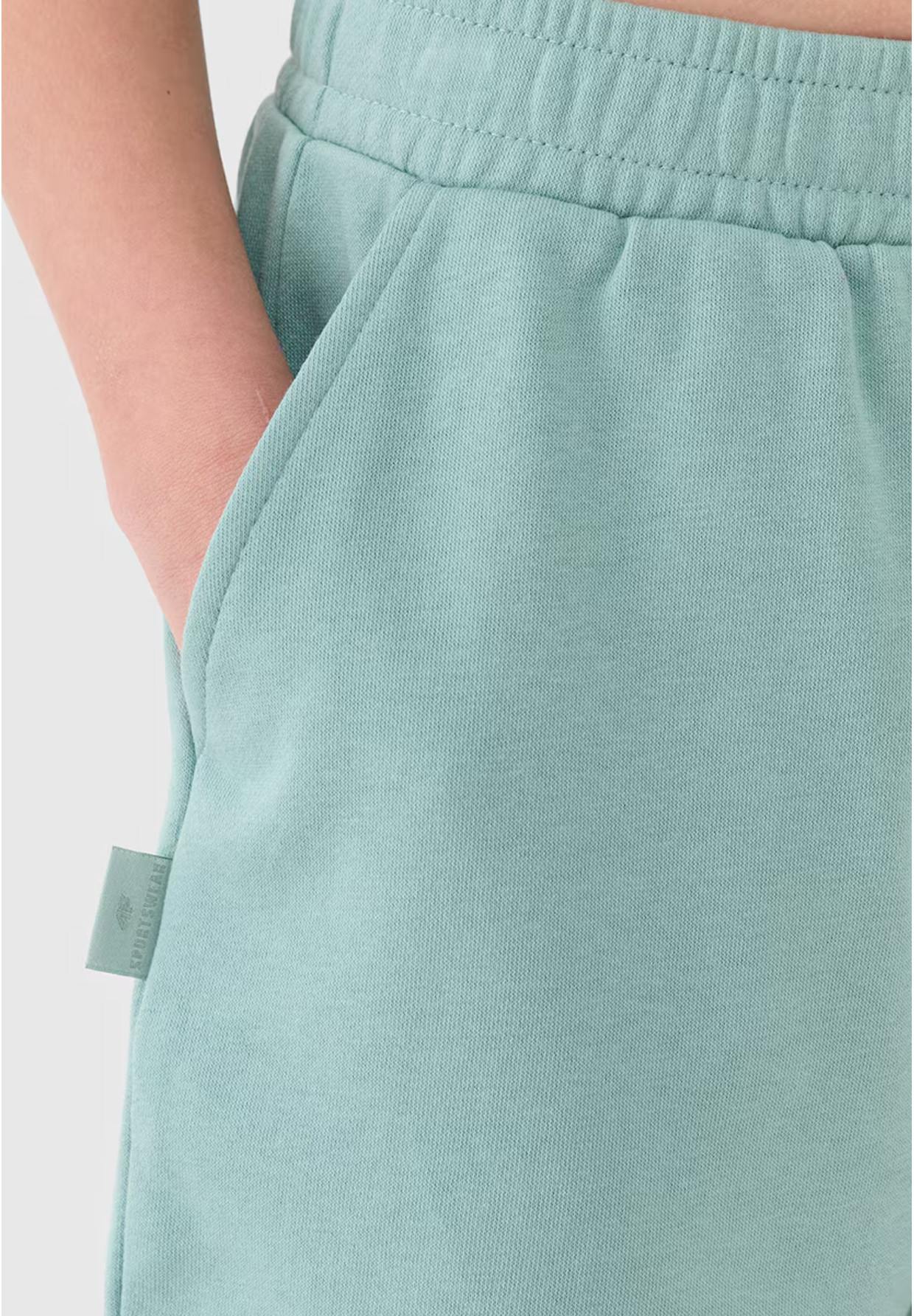 Spodenki Dresowe Dziewczęce 4F Luźne Oversize Przed Kolano Turkusowe 4FJWSS25TSHOF470