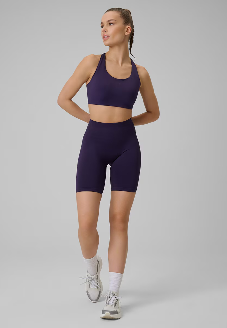 Kolarki Damskie 4F Sportowe Legginsy Szybkoschnące Bezszwowe Treningowe Fioletowe 4FWSS26TFSTF109