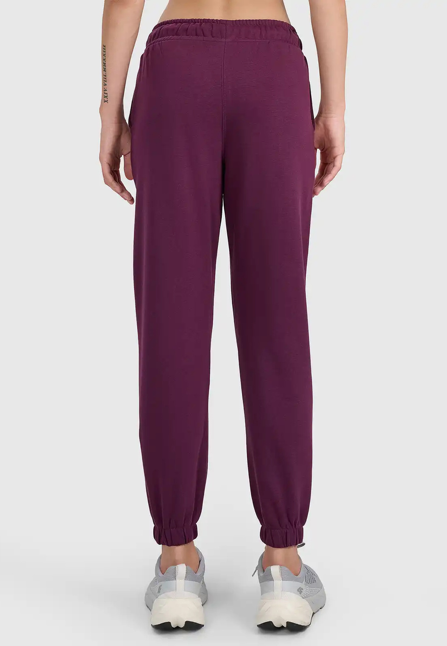 Spodnie Damskie Dresowe 4F Joggery Dresy Sportowe Burgundowe 4FWSS26TTROF1421