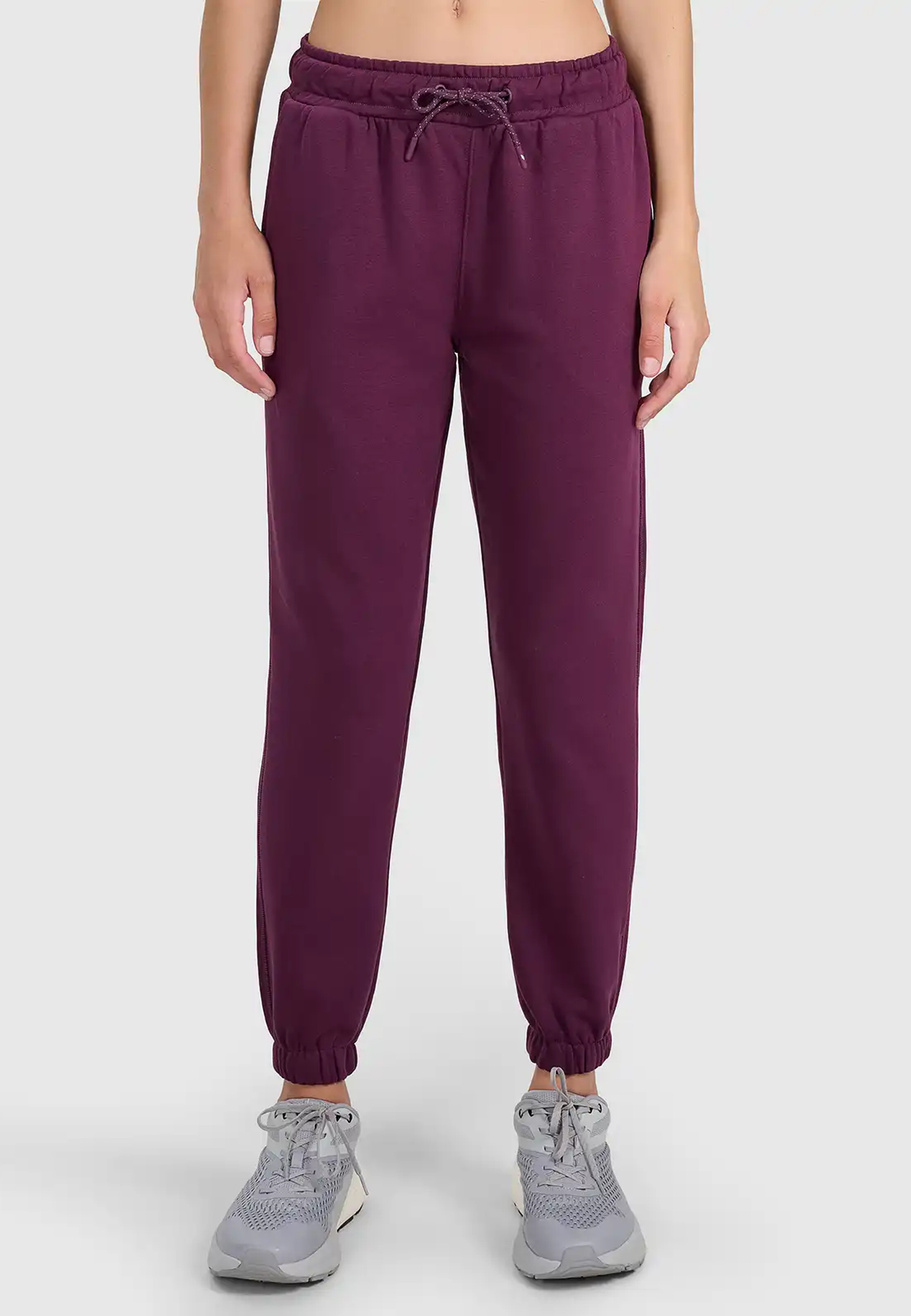 Spodnie Damskie Dresowe 4F Joggery Dresy Sportowe Burgundowe 4FWSS26TTROF1421