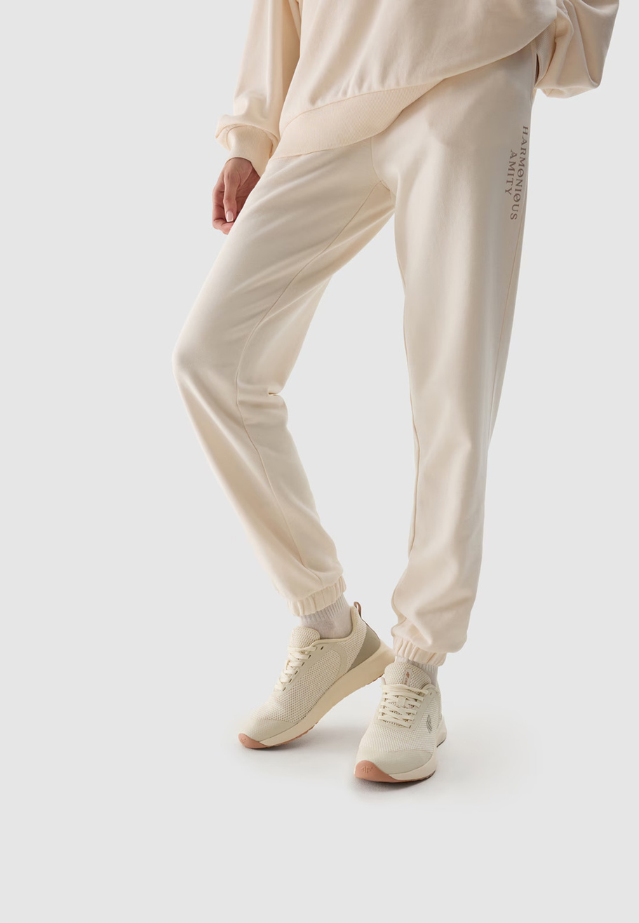 Spodnie Damskie 4F Joggery Dresowe Kremowe 4FWSS24TTROF665